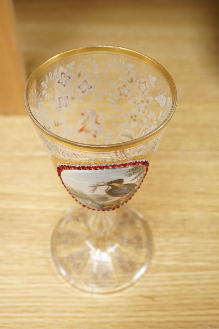 A Bohemian enamelled, overlaid and jewelled goblet, late 19th century, decorated with a Kingfisher grasping a fish, 20cm high
